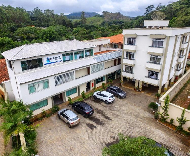 Apart Hotel Agua Limpa Prados Bagian luar foto
