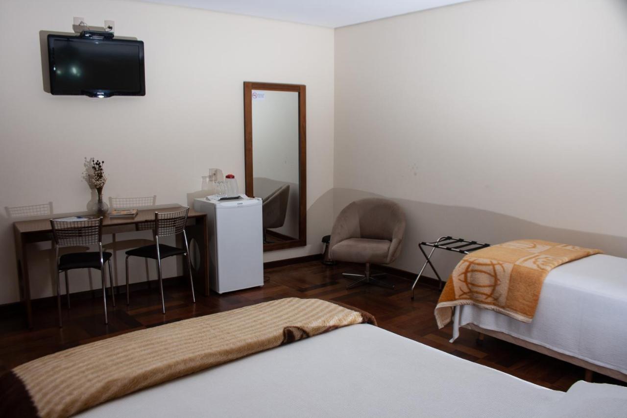 Apart Hotel Agua Limpa Prados Bagian luar foto