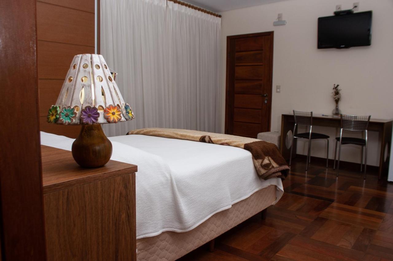Apart Hotel Agua Limpa Prados Bagian luar foto