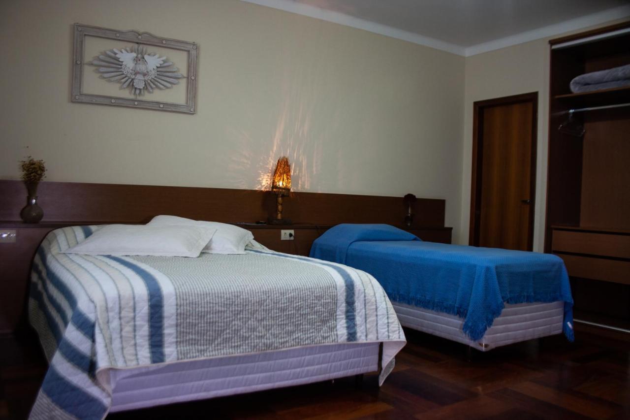 Apart Hotel Agua Limpa Prados Bagian luar foto